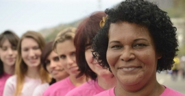 diverse women in pink charity walk